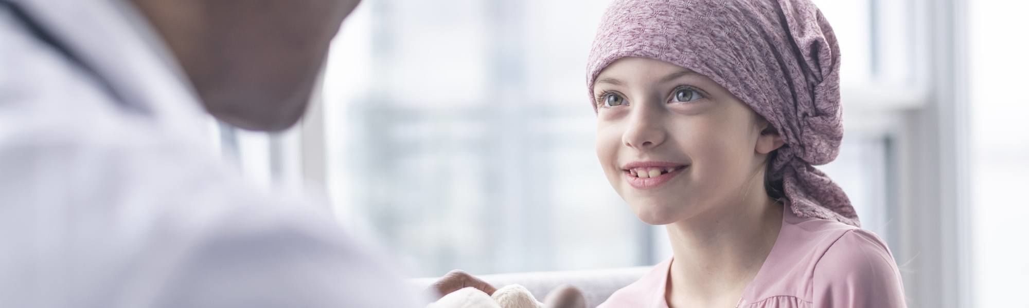 Courageous girl with cancer meets with doctor