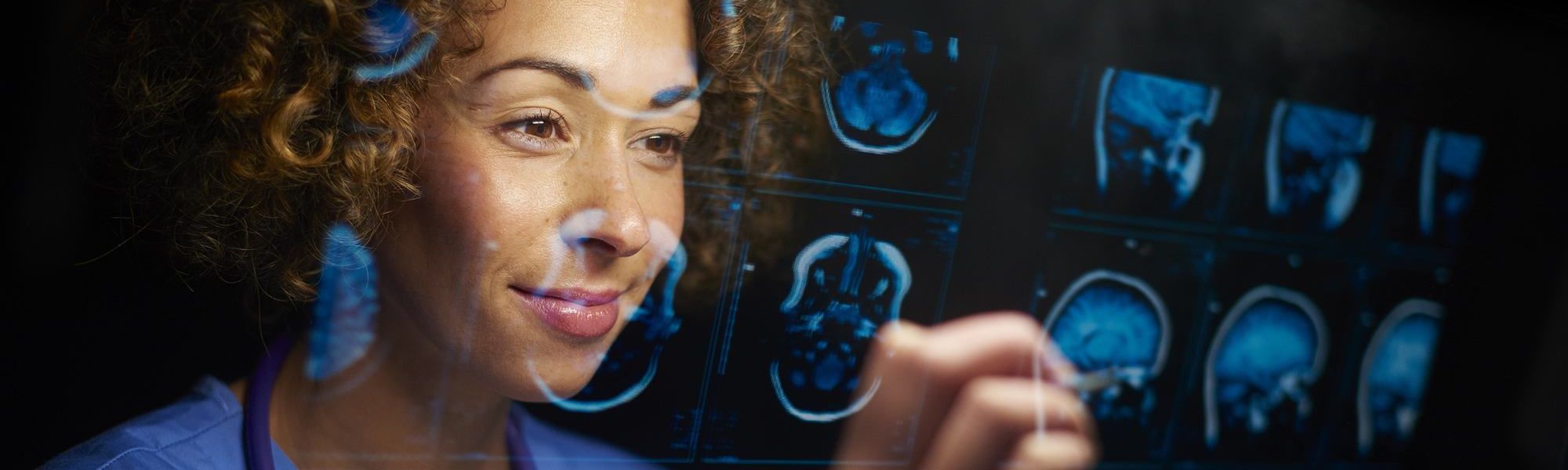 surgeon with mri scans