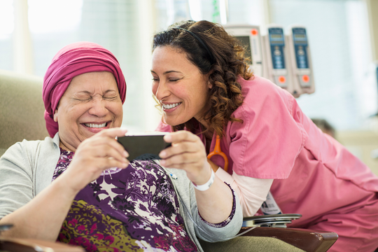 Medical professional and cancer patient